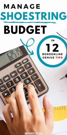 a person using a calculator on top of a desk