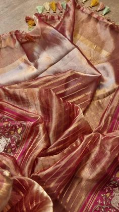 Pure Organza Tissue Silk Banarasi Stripe Pichwai Embroidery on Katan Silk Satin Border Saree Luxury Festive Katan Silk Sets, Luxury Banarasi Silk Traditional Wear With Printed Border, Luxury Silk Fabric With Zari Work, Luxury Banarasi Silk Shawl For Traditional Ceremonies, Luxury Banarasi Silk Embroidered Fabric In Traditional Style, Luxury Raw Silk Fabric For Traditional Ceremonies, Luxury Festive Raw Silk Fabric, Gold Embroidered Silk Pre-draped Saree, Luxury Elegant Embroidered Katan Silk Fabric