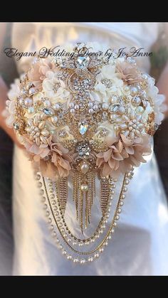 a bridal bouquet with pearls and flowers