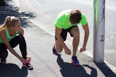 a man and woman tying shoes on the side of a street with text that reads eight steps to help someone start running