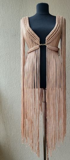 Long Beige Party Dress, Beige Long Maxi Dress For Party, Beige Maxi Dress For Festival, Spring Party Maxi Dress With Tassels, Festival Maxi Dress With Tassel Ties, Spring Party Dresses With Back Tassel Tie-up, Elegant Fringe Maxi Dress For The Beach, Spring Festival Maxi Dress With Tassels, Summer Party Maxi Dress With Tassels