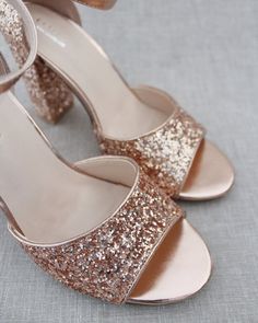 Sparkly glitter block heel sandals are perfect for date night, parties, or any special occasion.DETAILS:HEELS: 3 inchesCOLORS AVAILABLE: White, Silver, Gold, Rose Gold, Burgundy and NavyUPPER: Synthetic upper and liningMATERIALS: Mandmade outsoleORIGIN: ImportedSTYLE NAME: LAUREN Glitter Block Heel Wedding Heels, Wedding Glitter Block Heels, Sparkling Block Heel Wedding Sandals, Glitter Block Heel Wedding Shoes, Wedding Glitter Block Heel Sandals, Sparkling Heels For Summer Wedding, Sparkling Summer Wedding Heels, Summer Wedding Sparkling Heels, Glitter High Heel Sandals For Wedding