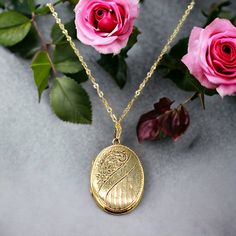 10k Gold Locket, vintage Oval Gold Locket, Engraved Locket Lovely 10k gold locket 1" x 3/4" with 18" gold filled chain. Secure closure. Locket has slight dings on back. Engraved Yellow Gold Oval Locket Necklace, Formal Heirloom Locket Necklace Stamped 14k, Victorian 14k Yellow Gold Locket Necklace, Heirloom Hallmarked Locket Necklace For Anniversary, 14k Gold Locket Necklace With Oval Pendant For Anniversary, Engraved 14k Gold Oval Pendant Locket Necklace, Heirloom 14k Gold Hallmarked Locket Necklace, Heirloom Yellow Gold Engraved Locket Necklace, Elegant Formal 14k Stamped Locket Necklace