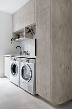 a washer and dryer in a small room