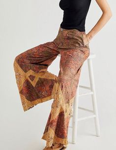 Free People These stunning pants are featured in a mid-rise, exaggerated wide-leg silhouette with vintage-inspired floral print and crochet lace piecing throughout. Zip fly and button closure Side pockets Relaxed, billowy, wide-leg fit Size 10 (medium) Waist, across the front, measures approx 16 inches Rise measures approx 11 inches Inseam measures approx 31.5 inches New with tags Hundreds of new Free People clothes, shoes and BAGS just listed. Lots of fabulous stuff! Frye Veronica Short, Printed Pants Outfits, Sweet Surrender, Style Roots, Chef Pants, Long Sleeve Layer, 70s Inspired Fashion, Cuffed Top, People Clothes