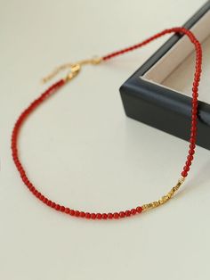 How can the New Year be complete without it? Introducing our Red Agate Beaded Necklace with scattered gold accents – the perfect accessory to enhance your complexion and add a radiant touch! Featuring delicate 3mm natural agate beads, this necklace is both versatile and sophisticated. The subtle gold elements effortlessly elevate its charm, ensuring a stylish yet timeless appeal.Scattered gold accents add a touch of luxury, making it a versatile piece that transcends trends.This high-end necklace is a must-have for the festive season, pairing seamlessly with light-colored sweaters for an absolutely stunning look. Its exquisite craftsmanship and festive vibes make it the ideal accessory to elevate your style and capture the holiday spirit. Don't miss out on this chic and sophisticated neckl Elegant Agate Beaded Necklaces With Colorful Beads, Elegant Colorful Agate Beaded Necklaces, Elegant Agate Beaded Necklace, Elegant Red Beaded Necklace With Colorful Beads, Elegant Red Beaded Necklace, Red Agate Beaded Necklaces With Round Beads, Elegant Agate Necklaces With Colorful Beads, Elegant Agate Beads For Gifts, Elegant Gemstone Beads For Gifts