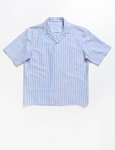 Full length flat shot of Brooklyn Tailors BKT18 Camp Shirt in Bar Stripe - Air Blue Cotton Camp Collar Top With Vertical Stripes, Relaxed Fit Tops With Vertical Stripes And Camp Collar, Cotton Top With Vertical Stripes And Camp Collar, Casual Shirt With Vertical Stripes And Camp Collar, Blue Cotton Shirt With Contrast Stripes, Summer Camp Collar Tops With Striped Collar, Striped Short Sleeve Shirt With Camp Collar For Spring, Summer Tops With Striped Camp Collar, Spring Striped Short Sleeve Shirt With Camp Collar