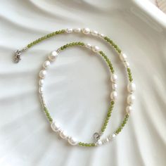 ✋100% HANDMADE ☘️ This handmade necklace is composed of light green jade, freshwater pearls, and silver glass beads. The color is fresh and elegant. It is very suitable for giving it as a gift to mother, girlfriend, wife, or yourself.     📏SIZE: 46cm long / 18 inch * If you need other lengths, please contact me or leave a message in the order. 📿 MATERIALS: 5-10mm natural freshwater pearl 3mm jade  3mm miyuki glass beads 14K Gold plated clasp 📦 PACKAGING: Each piece comes with a dust/moisture proof bag and a cotton bag for storage when not worn. They will be sent in a well-wrapped condition. If you have any ideas for the packaging, such as adding gift cards and messages, etc., please feel free to contact me. ✈️ SHIPPING AND DELIVERY: I fully understand your concerns about international s Gift To Mother, Choker Handmade, Gemstone Choker, Pearls Necklace, Jewelry Personalized, Silver Glass, Necklace Pearl, Pearl Gemstone, Freshwater Pearl Necklaces