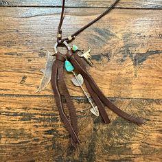 Handmade in Idaho by Weathered Soul exclusively for Bourbon Cowgirl. Limited Edition, high quality jewelry that is as unique and authentic as you! Due to their handcrafted nature, slight variations will occur. The feel and design of the product will remain true to the overall aesthetic. Features the following materials: Jewelers Pewter Copper Turquoise Deer Leather Made exclusively for us by Weathered Soul Bohemian Sterling Silver Necklace With Adjustable Length, Handmade Bohemian Sterling Silver Lariat Necklace, Bohemian Handmade Sterling Silver Lariat Necklace, Handmade Sterling Silver Bohemian Lariat Necklace, Bohemian Sterling Silver Lariat Necklace, Sterling Silver Lariat Necklaces For Festival, Bohemian Sterling Silver Lariat Necklaces, Bohemian Lariat Necklace In Sterling Silver, Sterling Silver Lariat Jewelry For Festivals