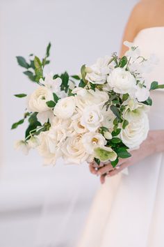 Taylor’s simple white rose wedding bouquet was the perfect wedding flower arrangement for her beautiful black tie wedding. We provide luxury wedding planning in Nashville and worldwide. Simple bridal bouquet, simple wedding florals, classy wedding flowers Bridal Bouquet Simple, Simple Bridal Bouquet, Wedding Bouquets White, Bouquet Luxury, Timeless Wedding Decor, White Rose Wedding, White Rose Wedding Bouquet, Simple Wedding Bouquets