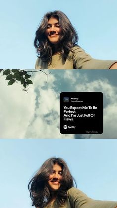 a woman with long hair standing in front of a blue sky