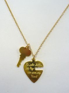 "Charming heart and key necklace on 18\" chain . Heart measures about 1\" and the key just a bit smaller. Engraved 'He who holds the key can open my heart.' Please check out all of our great vintage deadstock jewelry and accessories in our ETSY store SHOPHULLABALOO. Thanks!! The Hullabaloozers" Heart-shaped Necklace With Two Keys For Gift, Heart Shaped Two Keys Necklace For Anniversary, Gold Heart Necklace With Two Keys, Valentine's Day Heart Pendant Jewelry With Two Keys, Valentine's Day Key Jewelry Gift, Heart And Key Necklace, Open My Heart, Heart Bangle Bracelet, Plastic Bangles