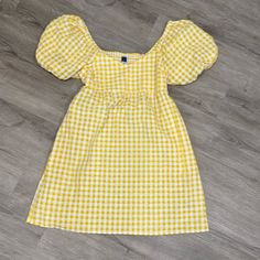 Perfect For Spring, Yellow Checkered Dress With Puff Sleeves. Never Worn Yellow Puff Sleeve Mini Dress For Summer, Casual Puff Sleeve Mini Dress For Picnic, Yellow Puff Sleeve Cotton Dress, Yellow Cotton Puff Sleeve Dress, Casual Plaid Puff Sleeve Dresses, Yellow Summer Mini Dress For Picnic, Yellow Mini Dress For Spring Picnic, Yellow Fitted Mini Dress With Puff Sleeves, Yellow Casual Mini Dress For Picnic