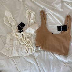 Never Worn. Runs Small. White Is Size Small. Tan Is Size Medium. Trendy Beige Tank Top For Day Out, Trendy Cream Tank Top For Summer, Trendy Beige Tank Top For Casual Wear, Trendy Beige Crop Top For Beach, Casual Neutral Crop Top For Summer, Beige Tops For Beach Day Out, Fitted Neutral Crop Top For Summer, Beige Tops For Beach Season Day Out, Trendy Beige Forever 21 Top