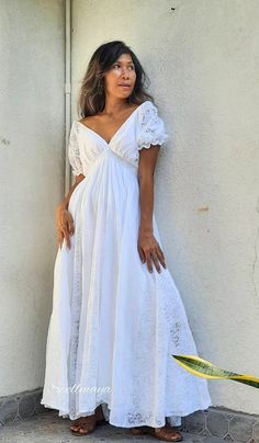 Handmade bohemian v neck maxi dress with floor length full circle skirt. There is the lace between a skirt with lining inside. Puffy lace sleeves. Elastic waist. 100% soft Cotton. There is 2 colors White and Off White. NOTE: Dress TK off white with white lace. waist 21 up to 45 inches. Dress SP off white with cream lace. waist 22 up to 46 inches. Dress E1 off white with white lace. White color lace FV with white lace. PLEASE LEAVE YOUR PHONE NO. AND EMAIL ADDRESS. Measurements: Bust up to 46 in Flowy Bohemian Dress With Empire Waist, Chic V-neck Maxi Dress For Beach Wedding, White Maxi Length Maternity Dress For Wedding, White Maxi Maternity Dress For Wedding, Bohemian Empire Waist Maxi Dress For Vacation, Bohemian Maxi Dress With Empire Waist For Vacation, Chic Empire Waist Wedding Maxi Dress, Summer Flowy Floor-length Maternity Dress, Bohemian Maxi Dress With Empire Waist For Garden Party