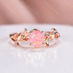 ☆Engagement Ring Details☆ -Center stone: 6mm Pink Fire Opal -Shape: Round Cut Band Width: 1.6mm ☆Material☆ 925 Sterling Silver, Rose Gold Plated, Yellow Gold Plated (Hypoallergenic, Nickel Free, Tarnish Resistant) Solid 10K/14K/18K Rose Gold/White Gold/Yellow gold(PLEASE choose 925 Sterling Silver or Platinum as material if you are allergic to nickel.) ☆Service Available☆ ☆Rush Order ☆Payment Plan ☆Engrave Service (should be less than 10 letter) ☆Customized Available ☆14 Days Return Policy ☆Ring Rose Gold Opal Promise Ring With Prong Setting, Leaf Wedding Ring, Fire Opal Engagement Ring, Wedding Ring Antique, Pink Opal Ring, Pink Fire, Twig Engagement Ring, Twig Ring, Fire Ring