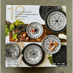 the magazine is on display with black and white plates