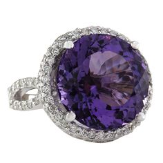 Stamped: 14K White GoldTotal Ring Weight: 9.0 GramsRing Length: N/ARing Width: N/AGemstone Weight: Total Natural Amethyst Weight is 12.31 Carat (Measures: 15.83x15.85 mm)Color: PurpleDiamond Weight: Total Natural Diamond Weight is 1.50 CaratColor: F-G, Clarity: VS2-SI1Face Measures: 19.52x19.72 mmSku: [702199W] Luxury Round Gemstones For Formal Occasions, Luxury Round Gemstones For Formal Events, Luxury Purple Amethyst Ring With Halo Setting, Luxury Purple Gemstones With Halo Setting, Luxury Amethyst Gemstones With Accent Stones, Luxury Round Amethyst Gemstones, Fine Jewelry Diamond Amethyst Ring With Halo Setting, Luxury White Gold Amethyst Ring With Diamond, Luxury Round Tanzanite Gemstones