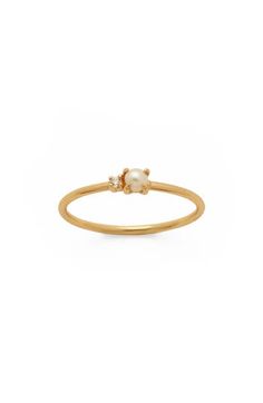 A single prong-set cubic zirconia shines to the side of a freshwater pearl on this delicate 14-karat gold vermeil ring. Sterling silver/14k-gold plate/freshwater pearl/cubic zirconia Imported Breastmilk Ring, Made By Mary, Nails Jewelry, Gold Pearl Ring, Dainty Gold Rings, Ring Inspo, Solid Gold Rings, Girly Jewelry, Christmas Wish List