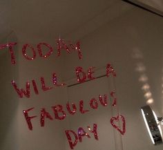 the words today will be fabulous day written in red glitters on a white wall