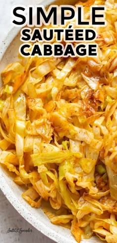 a white bowl filled with sauteed cabbage