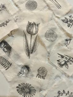 several pieces of cloth with flowers and leaves on them