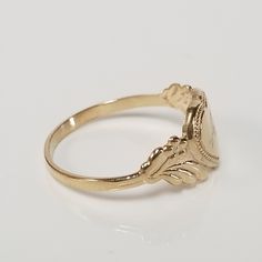 "Thanks for shopping our vintage estate store. We tend to sell well below wholesale and truly hope you enjoy all of our items. Many of the items are one of a kind, so please enjoy scrolling through the pictures and hopefully something will catch your eye. Brown spots are from camera or reflections. Estate 14k yellow gold monogram cursive capital A heart ring. Custom made ring for our shop. Ring size: 3 Setting: 7.5mm 1/4\" to 3/8\" Band width: 1.4mm Weight: 1.12 grams Marked 14k and it's sweet. Vintage Gold Initial Ring Stamped 14k, Classic 14k White Gold Heart Ring, Vintage Engraved Heart Ring For Wedding, Vintage 14k Gold Rings For Gift, 14k Gold Heart Ring With Oval Shape, Oval 14k Gold Heart Ring, Heirloom Engraved Heart Ring, Classic 14k Gold Heart Ring, Vintage Gold Initial Ring For Anniversary