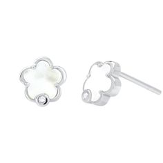 They say the earth laughs in flowers. These gorgeous Floret earrings honor the sweetest masterpieces of nature as well as the sweetness in ourselves. Scroll down to our Gem Guide to learn more about Diamonds. Measurement: 8.1 x 8.5 x 1.2 mm Weight: 2.052 grams 18k gold Please allow 4-6 weeks for production.