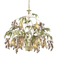 a chandelier with flowers hanging from it's center and leaves on the bottom