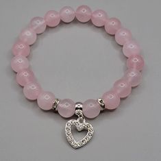 Cheap Pink Heart Bracelet, Affordable Pink Heart Bracelet, Cheap Heart-shaped Cute Stretch Bracelet, Cheap Elegant Pink Heart Bracelet, Cheap Pink Stretch Bracelet With Heart Charm, Cheap Pink Beaded Bracelets With Heart Charm, Cheap Handmade Heart-shaped Beaded Bracelets, Cheap Cute Heart-shaped Bracelet, Cheap Pink Heart Bracelet As A Gift