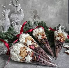 christmas treats are wrapped in cellophane to look like cones