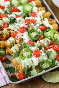 loaded taquitass and creamy jalapeno dip are the perfect appetizer for any mexican party