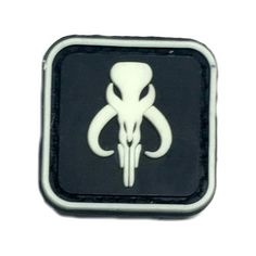 the star wars symbol is shown on a black and white square button with an antelope skull