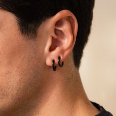 Edgy yet minimalist, our sleek Black Hoops will elevate any outfit. Whether dressed up for a special occasion or sporting a casual everyday look, these versatile earrings are a must-have in his collection. Grab all three sizes to create a set and you have the perfect gift for him! SKU: RR-ER422, RR-ER423, RR-ER424; BB-EB040 Product Details Material: Stainless Steel ∙ Hypoallergenic ∙ Waterproof ∙ Tarnish Free Finish: Black IP Featured Styles Featured Styles & Dimensions (All Sold as Pairs): Styl Modern Black Hypoallergenic Hoop Earrings, Black Minimalist Cartilage Earrings For Everyday, Modern Black Piercings For Gift, Modern Black Piercings As Gift, Black Minimalist Small Hoop Earrings, Modern Black Hoop Earrings For Everyday, Minimalist Black Small Hoop Huggie Earrings, Minimalist Black Hypoallergenic Piercings, Black Hypoallergenic Minimalist Piercings