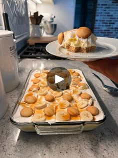 a pan filled with food sitting on top of a counter