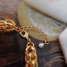 "⭐ Extra Super Chunky Gold Chain Bracelet, Thick Bold Multilayered Chain Bracelet, Large Big Oversize Layering Stacking Statement Bracelet ⭐ BRACELET MEASURE * Total Chain Length: 6.5\" chain + 2\" extender * Chain Thickness: 14mm * Closure: Lobster Clasp If you are interested in other sizes, please click the link below. https://www.etsy.com/listing/973480152/extra-super-chunky-curb-link-chain?ref=shop_home_recs_1&frs=1 ⭐ MATERIAL & QUALITY: ✅Hypoallergenic ✅Water Resistant ✅Tarnish Resi Gold Alloy Charm Bracelet For Party, Gold Charm Bracelet For Party, Gold Metal Chain Bracelet With Double Chain, Metal Chain Bracelet With Lobster Clasp As Fashion Accessory, Gold Double Chain Metal Bracelet, Gold Chain Link Charm Bracelet, Gold Alloy Charm Bracelet With Chain Details, Gold Alloy Chain Charm Bracelet, Gold Chain Bracelet In Alloy