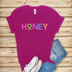 What a great t-shirt for your HONEY! This is the ideal gift for any HONEY Grandma or other family member. Give as a gift to a new Grandmother, honey lover or bee enthusiast! Bella and Canvas shirt is made of soft cotton and fits true to size. We adore our small business -- please check out our website: www.thywillbeedone.com   .: 100% Cotton .: Tear away label .: Runs true to size Honey Shirt, Grandmother Gifts, Grandma Gift, Gift For Grandma, Great T Shirts, Grandma Gifts, Womens Clothing Tops, Ideal Gift, Tee Shirt