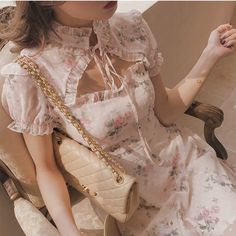 Petal Breeze is a Vintage-style Chiffon Fairy Dress in warm creamy pastel with a pretty vintage faded shabby chic rose floral print, creamy lining, and a feminine silhouette. *It's a favorite among our customers Size S bust 80-82cm waist 66-68cm length 86cm-89cm Size M waist 70-72cm bust 86cm length 89cm-90cm Size L waist 74-76cm bust 90cm length 90cm-91cm Size XL bust 96cm waist 80cm length 90cm-91cm Material: Polyester Angel Core Aesthetic Outfits, Braidsmaid Dress, Core Aesthetic Outfits, Paris Coquette, Angel Core Aesthetic, Victorian Inspired Fashion, Building Wardrobe, Shabby Chic Aesthetic, Kawaii Swimsuit