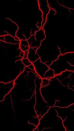 red lightning streaks in the dark sky