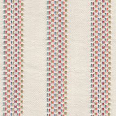 a white and red striped wallpaper with multicolored dots on it's side