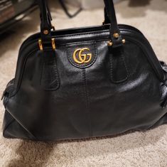 Excellent Condition. There Is A Small Scratches But Almost Brand New Beautiful Vintage Black Leather And Big Size Of Women Handbag. It Was Gucci Luxury Line Bag And It Is Good Bag For You If You Carry A Lots Of Stuff With You. No Refund. No Exchange. Gucci Satchel For Office, Black Gucci Top Handle Satchel, Gucci Black Satchel With Gold-tone Hardware, Black Gucci Satchel With Gold-tone Hardware, Gucci Black Bag With Gold-tone Hardware, Gucci Black Leather Satchel, Black Gucci Leather Satchel, Classic Black Gucci Satchel, Black Leather Gucci Satchel