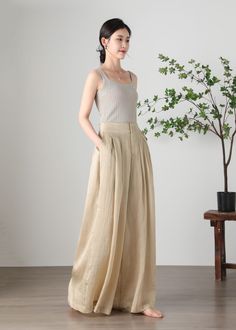 Summer Wide Leg Cargo Pants, Beige High Waist Summer Pants, Summer Day Out Casual Pants, Baggy Summer Bottoms, Summer Chic Baggy Harem Pants, Baggy Bottoms For Summer, Non-stretch Wide Leg Harem Pants For Summer, Non-stretch Wide Leg Pants For Summer, Summer Baggy Wide-leg Bottoms