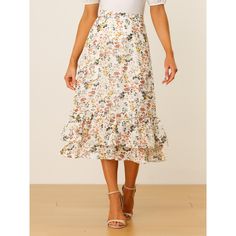 Featuring pretty ditsy floral prints, this midi skirt is a summer option that can be worn with just about anything. Channel elegant style in this midi skirt which is beautifully printed with a blossom pattern for a versatile look. It is made of lightweight fabric, adding definition to the free-flowing design. Falling to a waterfall midi hem, it sits high on the waist with a discreet side zip fastening. Summer days call for effortlessly feminine styles like skirts. Floral Print Flowy Skirt For Garden Party, Flowy Summer Midi-length Bottoms, Spring Midi Maxi Skirt For Garden Party, Flowy Maxi Skirt For Spring Garden Party, Flowy Ruffled Midi Length Skirt, Flowy Skirt For Spring Garden Party, Spring Floral Print Tiered Maxi Skirt, Summer Floral Print Tiered Skirt, Spring Floral Print Flowy Skirt