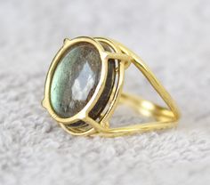 Custom Labradorite Moonstone Opal Tsavorite Amethyst Peridot Ring We have thousand of Designs- Please choose any gemstone and Design and we will have the Estimate for you within 1-2 days. Feel free to call text whats app on US Mob +1-714-924-2732 Inv#117#7 S22 Yellow Gold Labradorite Round Jewelry, Gold Round Gemstones With Large Stone, Unique Oval Moonstone Ring With Bezel Setting, Unique Round Peridot Jewelry, Green Moonstone Round Jewelry, May Birthstone Jewelry With Large Round Stone, Unique Oval Birthstone Gemstones, Unique Peridot Jewelry, Round Natural Gemstones For May Birthstone