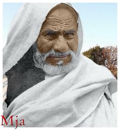 an old man with white hair and beard wearing a white shawl over his head