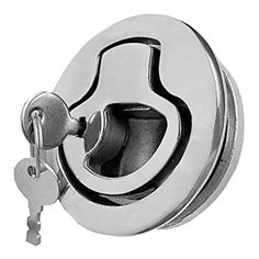 a chrome door handle with a key on the front and side lock in an oval shape