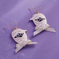 Mummy with Googly Eyes Halloween Hook Earrings - Mummy Figure Design - Playful Googly Eyes - Hypoalligic Titanium Earrings - Perfect to Wear for Halloween **Size: Approx. 1.75" Drop Length Halloween earrings evoke spooky charm with their themed designs. From miniature pumpkins to tiny ghosts, these accessories capture the playful spirit of the holiday. Whether subtly stylish or boldly themed, they add a whimsical touch to any Halloween ensemble, making them a delightful choice for both costume p Googly Eyes Halloween, Eyes Halloween, Scarf Coverup, Rebecca Black, Figure Design, Titanium Earrings, Googly Eyes, Costume Parties, Halloween Earrings