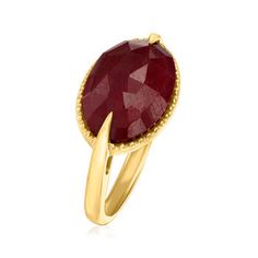 Ross-Simons - 7.00 Carat Ruby Ring in 18kt Gold Over Sterling. Size 9. Try sporting your gemstones in a new fashion with this contemporary ring! The rich pomegranate-hued 7.00 carat oval ruby is showcased inside a beaded 18kt yellow gold setting, creating a sleek east-west design. 3/8" wide. Ruby ring. Ruby birthstones are the perfect gift for July birthdays.