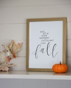 a white shelf topped with a pumpkin and a framed sign that says, and all at once summer will be passed into fall