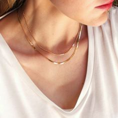 Gold Necklaces for WomenThis gold chain necklace set is the perfect layering combo! A herringbone necklace and a dot chain make this minimalist jewelry set a must have. Wear them together or one at a time, so many options!•Set of two necklaces •Top layer - 3mm 18kt gold filled herringbone chain-Bottom Layer - 18kt gold plated -lead, nickel & cadmium freeThese chains are NOT connected so you can wear them together, one at a time or with something else. Trendy Herringbone Necklace With Delicate Chain For Gift, Dainty Snake Chain Necklace For Everyday, Everyday Trendy Delicate Snake Chain Necklace, Chic Delicate Chain Herringbone Necklace As Gift, Trendy Everyday Delicate Snake Chain Necklace, Trendy Everyday Layered Snake Chain Necklace, Dainty Tarnish Resistant Snake Chain Necklace, Minimalist Snake Chain Necklaces For Layering, Chic Herringbone Necklace With Delicate Chain As Gift